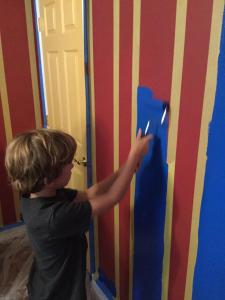 Spencer rolling out his dream wall.