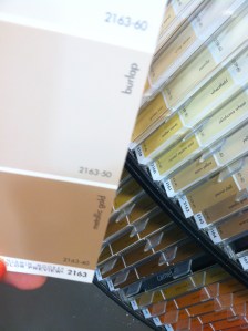 Small spaces can handle rich color. Metallic Gold for the living room and Burlap for the dining room.