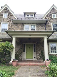 For this house, we let go of the old shutters and chose that unexpected greasy green for the front door.