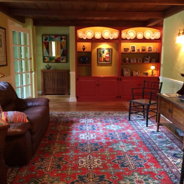 Another view of that lively entryway using earthy historic colors.