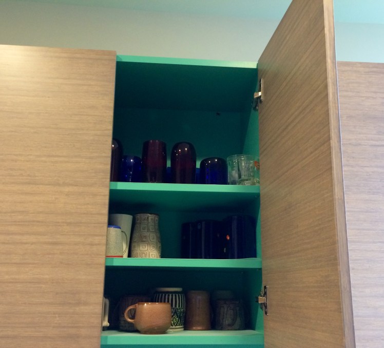 Consider giving yourself a visual thrill when opening a cabinet door.