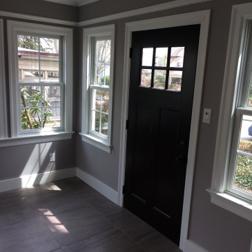 Client W wanted a soothing but rich wall color to work with the black door and grey flooring. We went with this strong griege with its plum undertone.