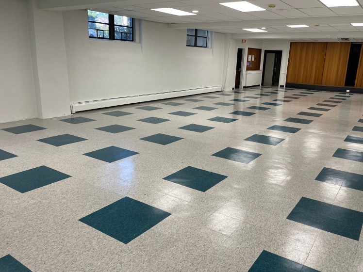 Church basement needed a lift badly -- clients wanted it bright and clean in the most economical way. A bright but earthy white and new floor tiles in white and that beautiful teal did the job.
